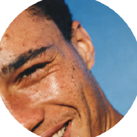 Close up of smiling man's face.