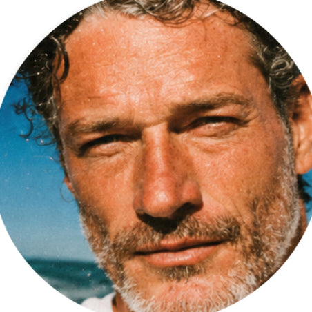 Close up of man with stubbly beard.